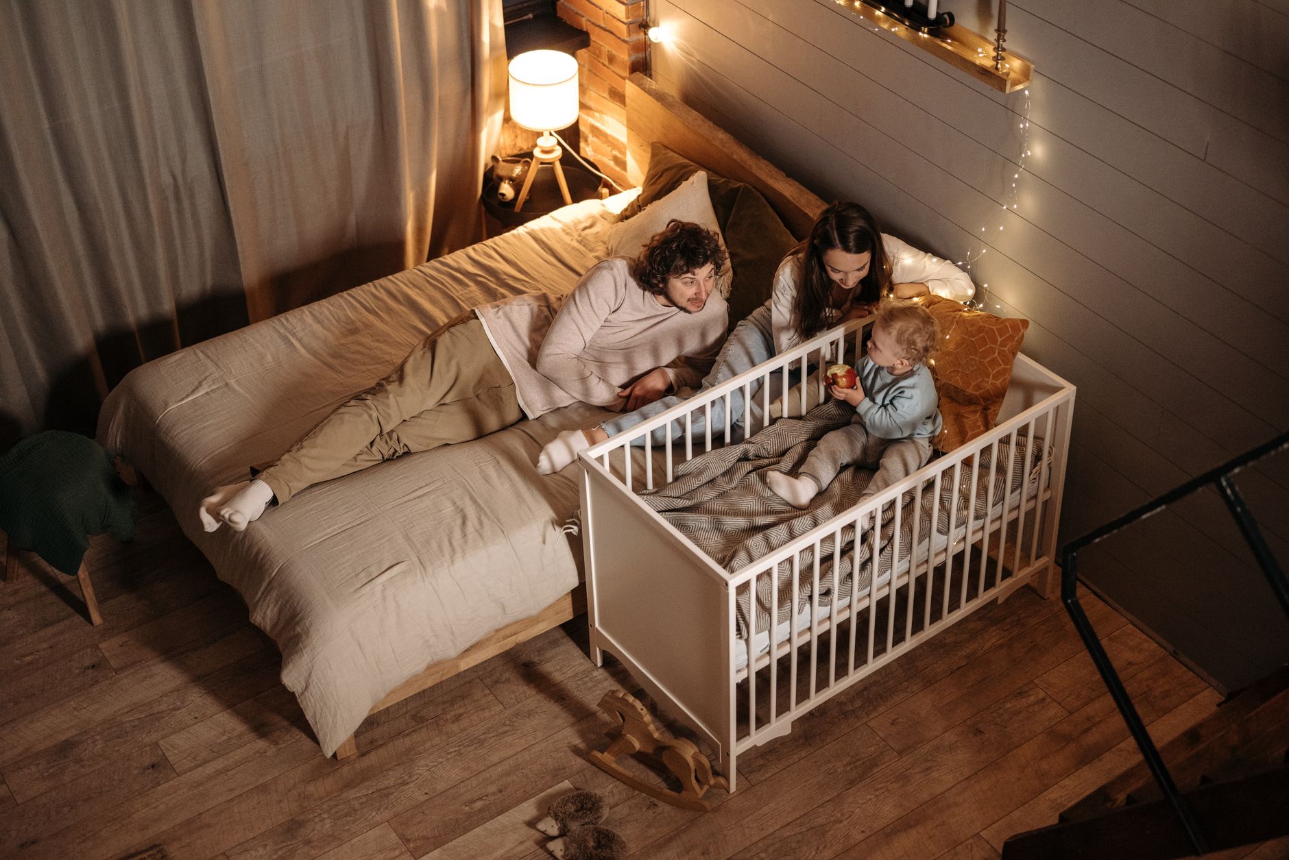 a family in the bedroom together